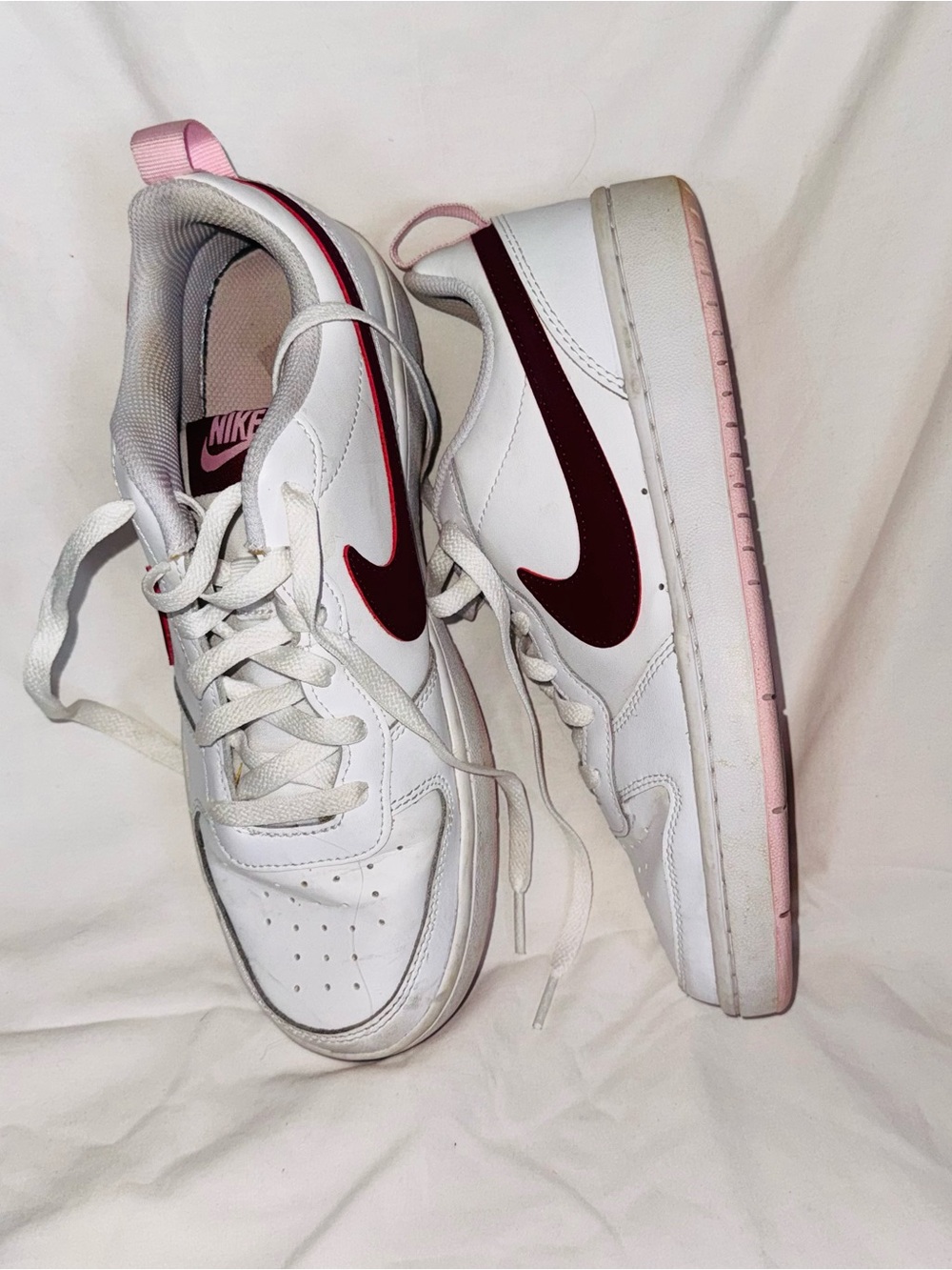 Nike Women’s White Sneakers with Burgundy Swoosh and Pink Accents